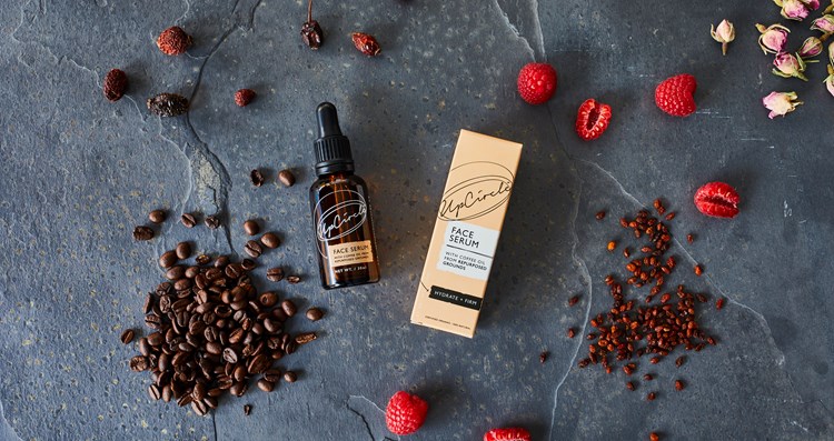 upcircle face serum surrounded by ingredients