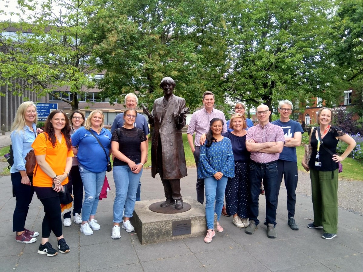 A group of previous programme participants in Bury